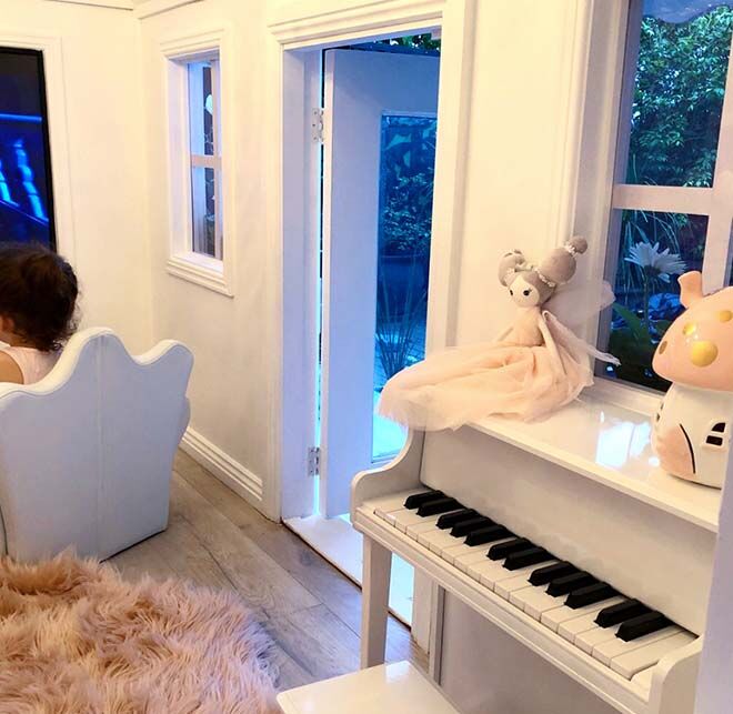 Baby grand piano in cubby house