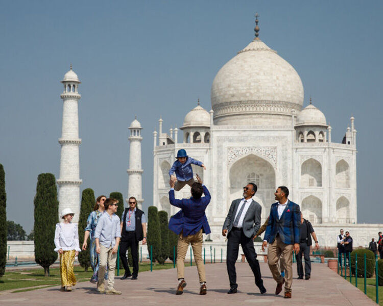 Hadrien Trudeau being thrown into the air on trip to India