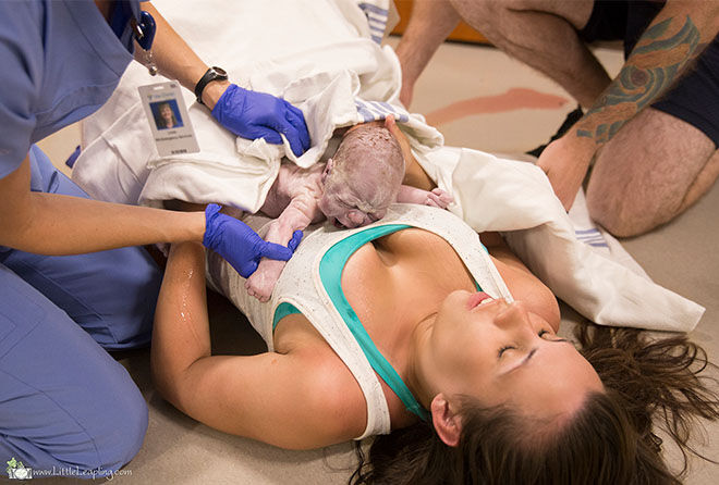 Woman gives birth in hospital hallway