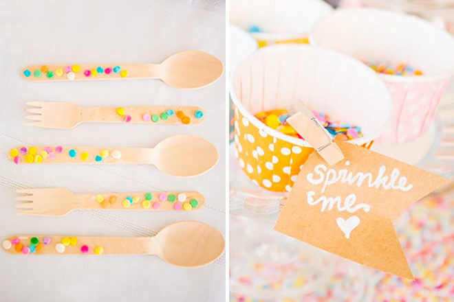 Baby shower sprinkle table confetti and wooden cutlery