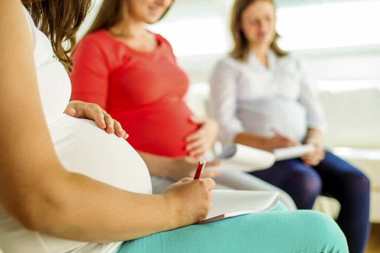 Pregnant mummas taking a pregnancy Birthing class