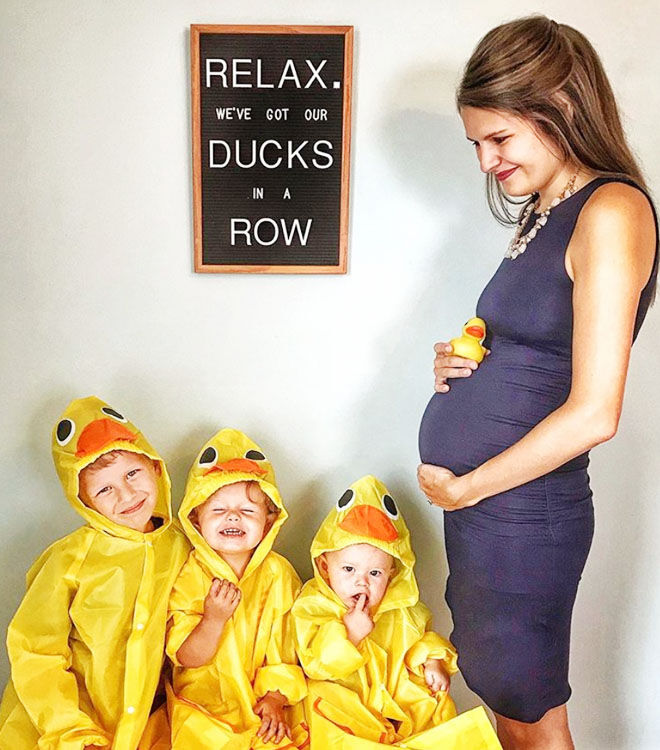 Ducks in a row pregnancy announcement with three siblings