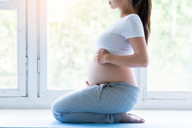 pregnant mumma relaxing yoga
