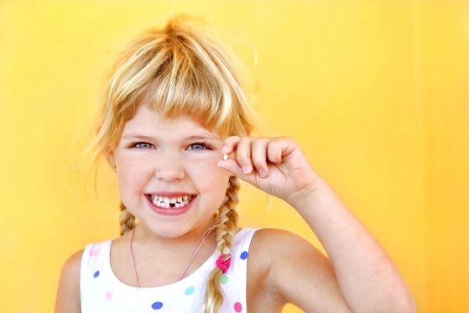 Girl Missing Tooth traditions around the world