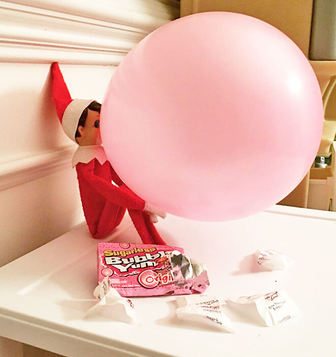 Bubblegum blowing Elf on the Shelf