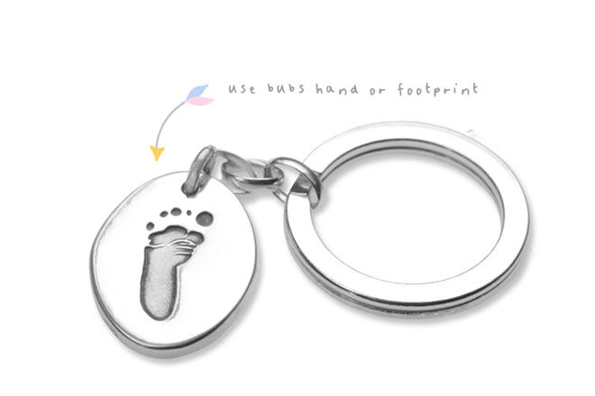 Baby footprints on keyring, Smallprint