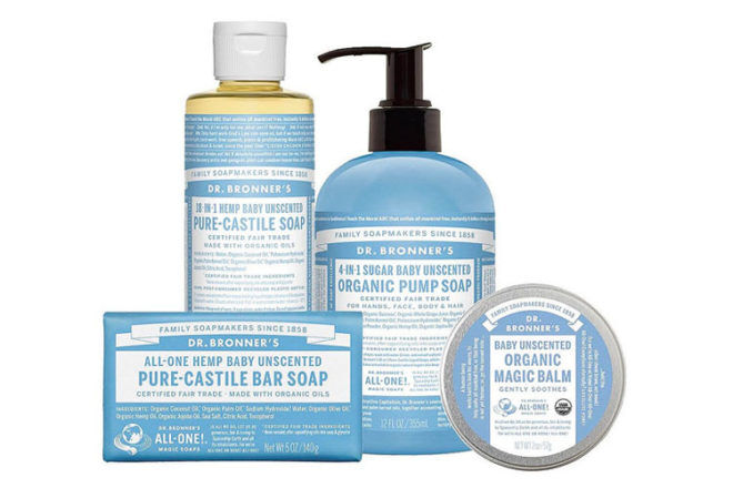 Front view of a group of Dr Bronner's organic baby products, showing the name of each product, size comparison and how they each come packaged.