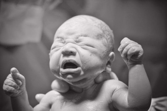 Newborn baby moments after birth