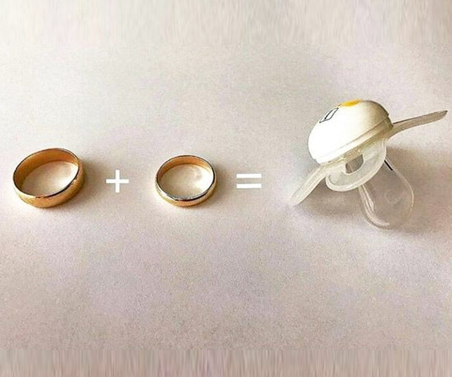 Dummy and wedding rings pregnancy announcement