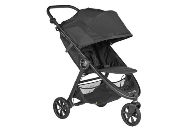 Side angle view of Baby Jogger City Mini GT2 compact stroller, showing canopy, seat and mesh storage basket.
