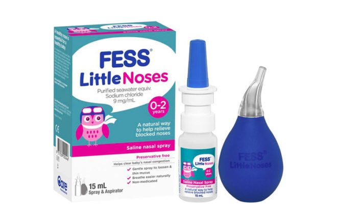 Close up front view showing FESS Little Noses saline spray next to the nasal bulb for size comparison, as well as the box. 