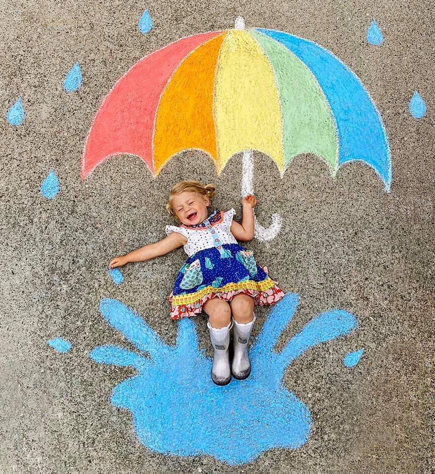 Abbey Burns Tucker side walk chalk art umbrella