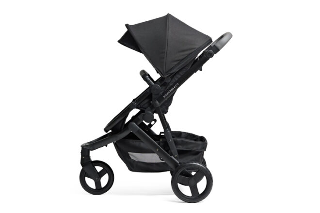 Side view of Edwards and Co Oscar M2 lightweight stroller, showing canopy, wheels and large basket.