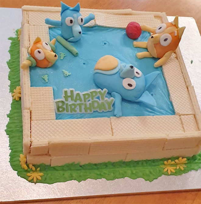 Homemade Bluey pool birthday cake