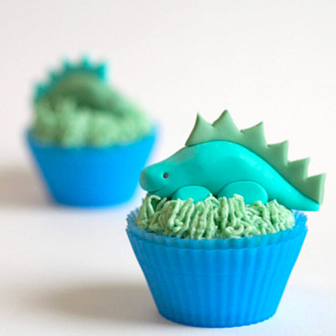 Blue and green 3D dinosaur cupcakes