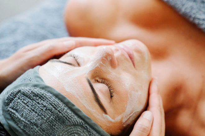 An Endota Spa new mum pampering gift idea showing a close up of woman enjoying a facial.