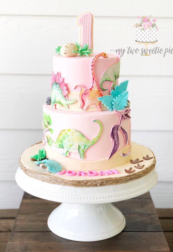 Girl dinosaur cake