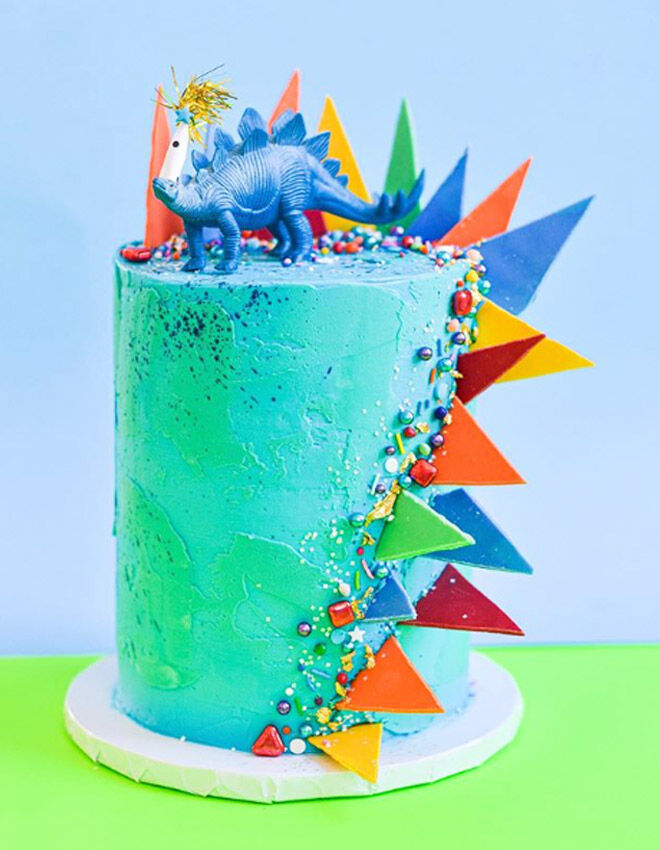 dinosaur cake with colourful spikes