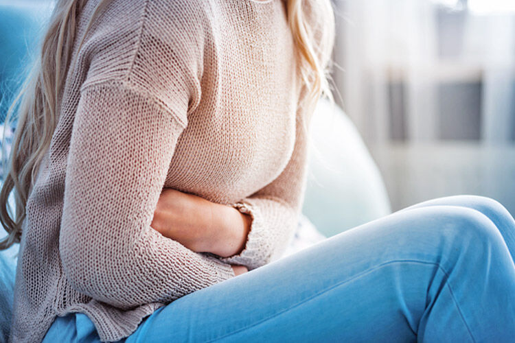 What do early pregnancy cramps feel like, and what causes them?