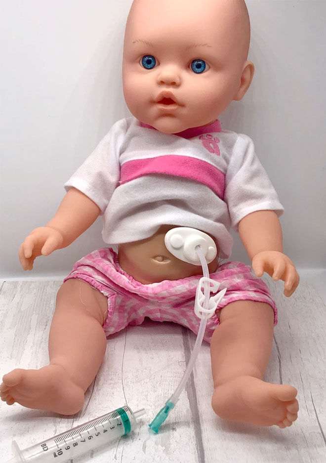 Doll with feeding tube
