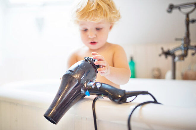 Hair dryer in bath - home safety hazards