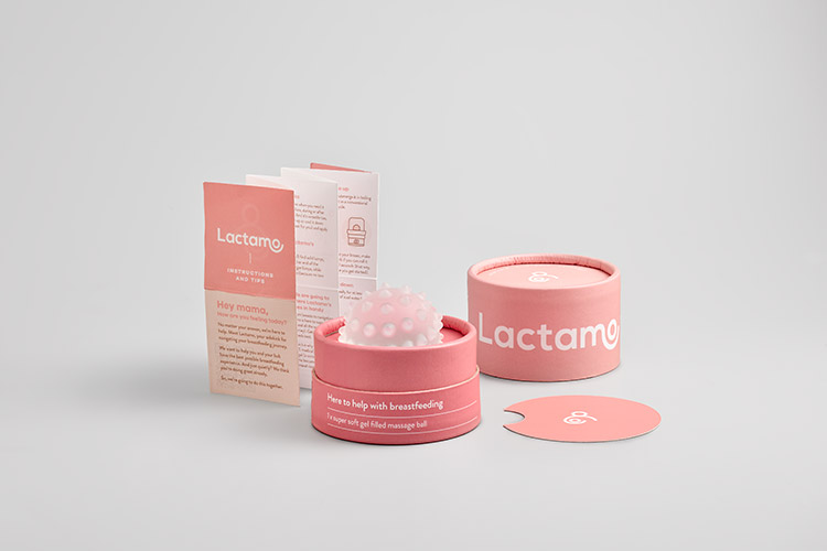 Close up of Lactamo Lactation Ball postpartum gift showing how the product is presented in the packaging and that it comes with instructions. 