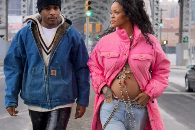 Rihanna & A$AP Rocky walking under bridge