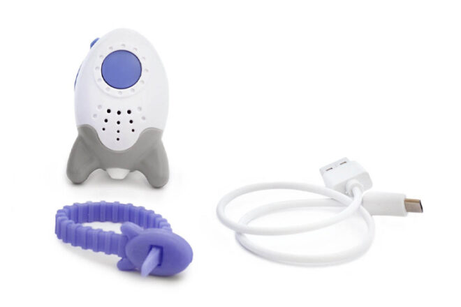 Rockit Wooshh Baby White Noise Machine showing the rocket shaped devise from front view, usb power charging cord and hand purple locking mechanism to secure the unit ot a pram.