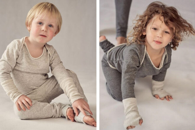 Awakind kids' nightwear in two colours modelled by active toddlers showing the envelope shoulders, sleeve detail and stretchy fabric.
