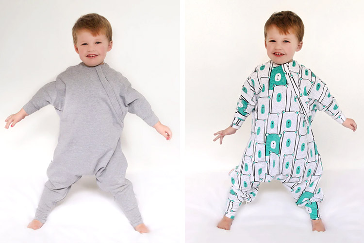 Toddler wearing Baby Loves Sleep Toddler Suit two different colours, showing full coverage as well as comfort for an active toddler.
