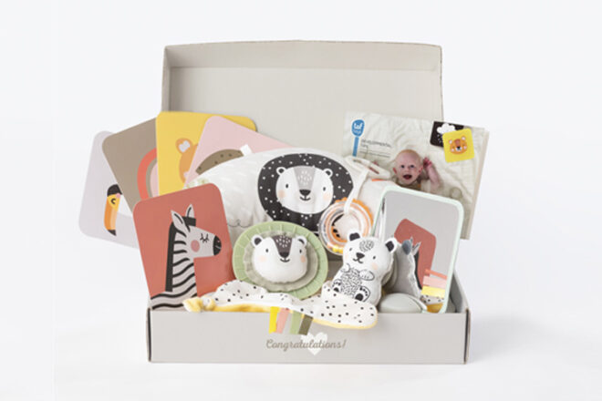 open box showing whats inside the TAF Toys newborn play kit