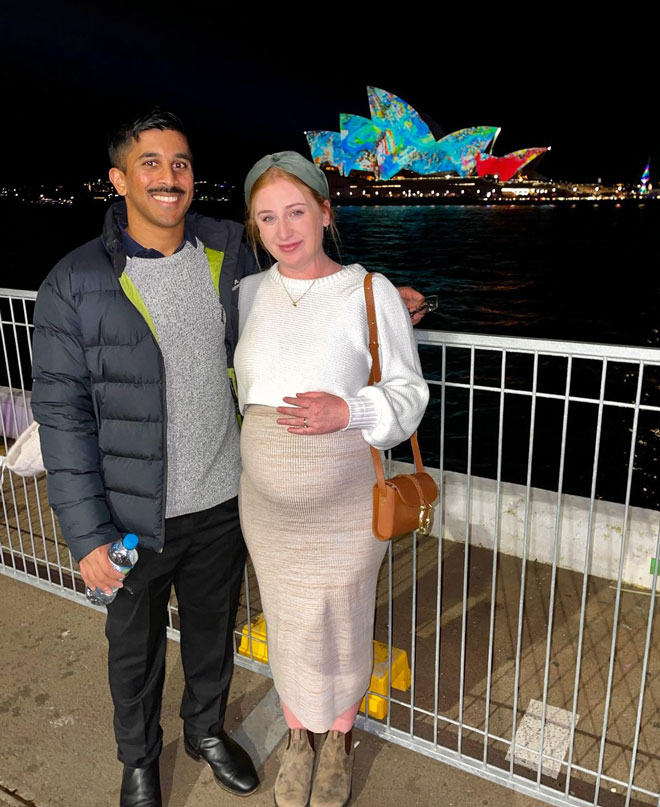 Pregnant Grace and her husband on holidays in Sydney