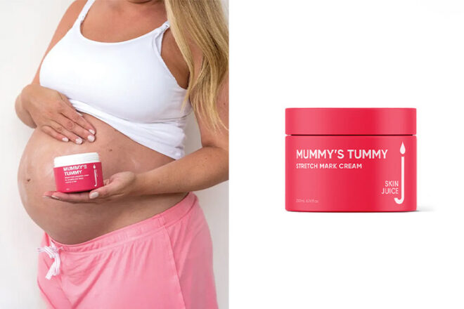 Skin Juice Mummys Tummy stretch mark cream in a 200ml hot pink screw top bottle held by a pregnant woman