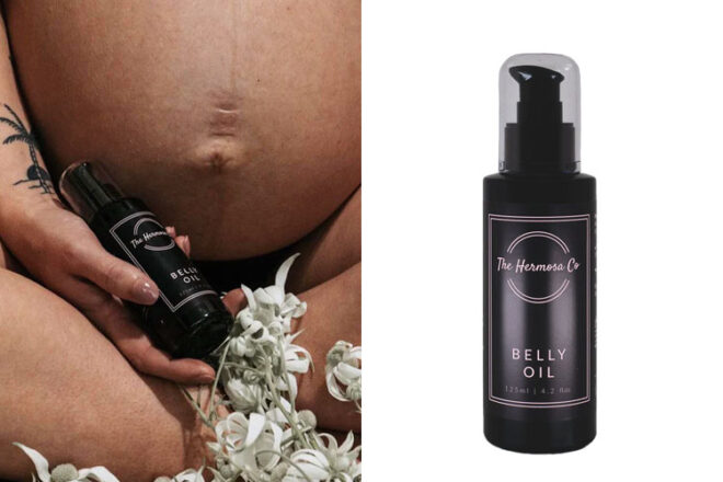 The Hermosa Co Belly Oil showing the 125ml spray bottle in the hands of a pregnant mum