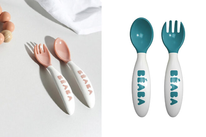 Beaba training spoon and fork on a table in pink next to and another set in blue showing the shape and differences in colour