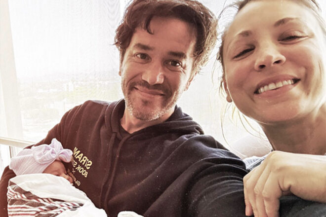 Kaley Cuoco and Tom Pelphrey holding their newborn baby