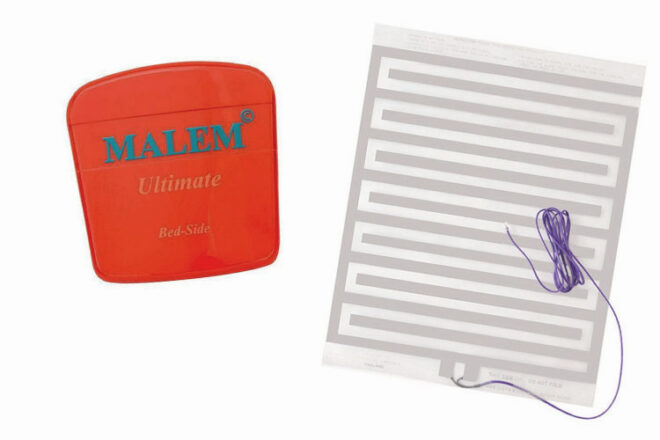 Red malem device next to a foil bedwetting sensor showing sizes and package inclusions