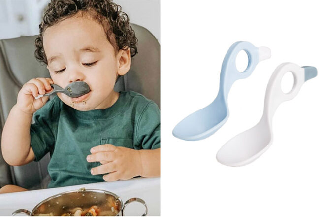 Toddler using Mini and Me duck shaped baby cutlery next to two spoons showing colours and innovative animal shape 