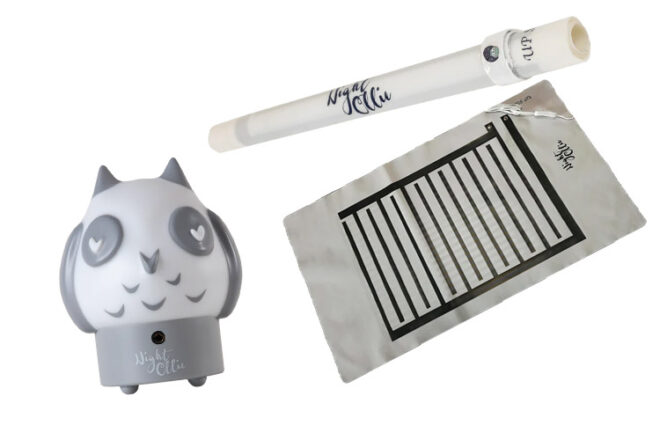Night Ollie owl light up alarm next to foil mat showing colour and design