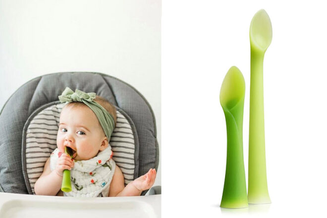 Baby using Ola baby cutlery next to two spoons showing comparing colours and size difference