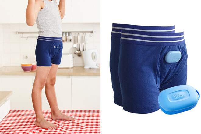 Pjama boxers in blue on a young person next to individual pairs of boxers with the sensor attached, showing use of product