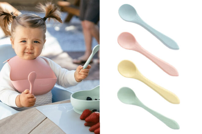 Toddler using Wild Indiana baby cutlery next to four spoons showing the different pastel colours and size