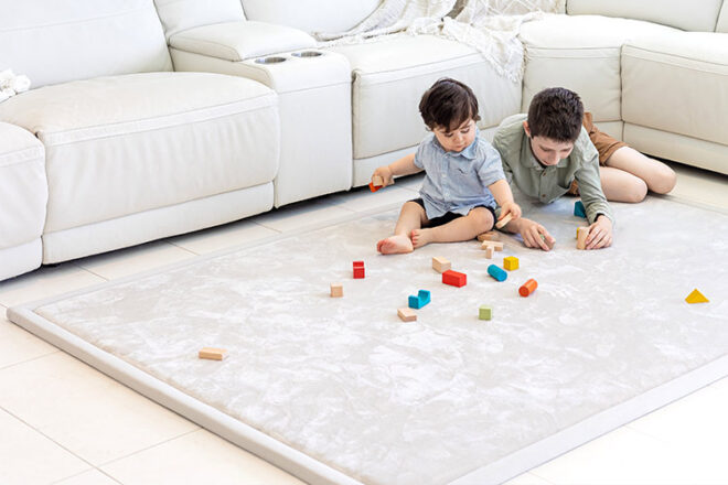 Loungey Cloudey Mat with two boys playing blocks