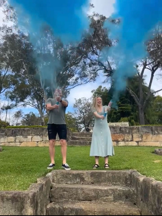 Blue smoke erupting in gender reveal