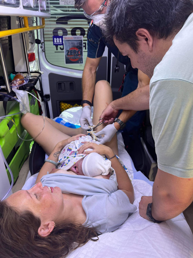 Husband cuts umbilical cord in ambulance