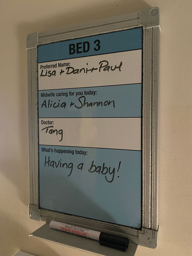 A hospital room sign saying Lisa, Danni and Paul