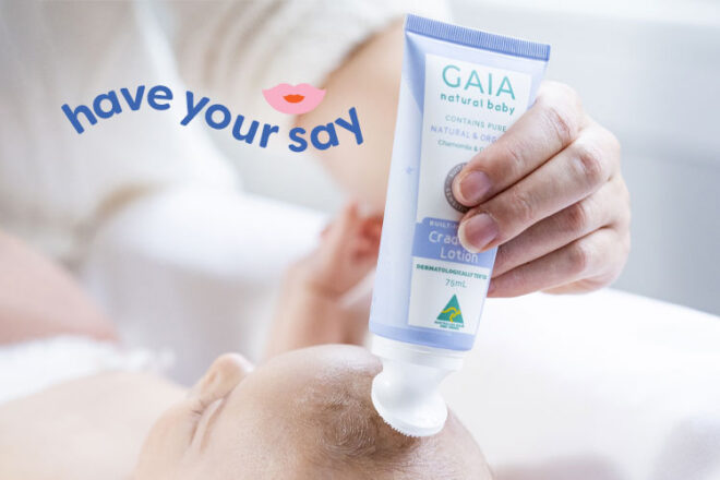 Mother applying GAIA Cradle Cap Lotion to her baby's scalp