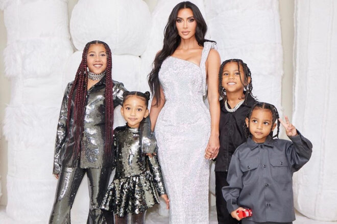Kim Kardashian posing with her four children in 2023