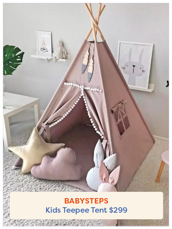dusky pink teepee opened showing toys inside