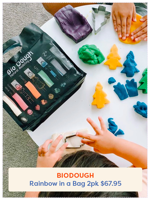 a child playing with the Bio Dough Rainbow playdough bundle